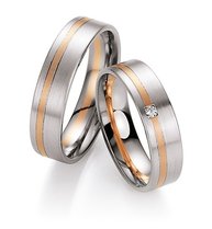 Bicolor trouwringen met diamant