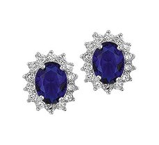 Gerhodineerd zilveren oorknoppen met saffier en zirkonia. Gerhodineerd zilveren oorknoppen met saffier en zirkonia.