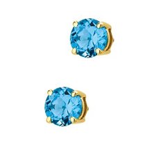 Geelgouden oorknoppen met topaas. Geelgouden oorknoppen met topaas.