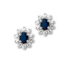 Witgouden oorknoppen met saffier en zirkonia.