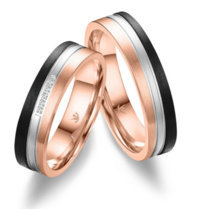 Trouwringen rosegoud, goud met carbon Trouwringen rosegoud, goud met carbon
